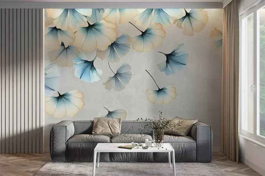 fototapeter Pastellfargede blå og gule ginkgoblader med delikate kronblader som svever i luften mot en teksturert bakgrunn w08578v1