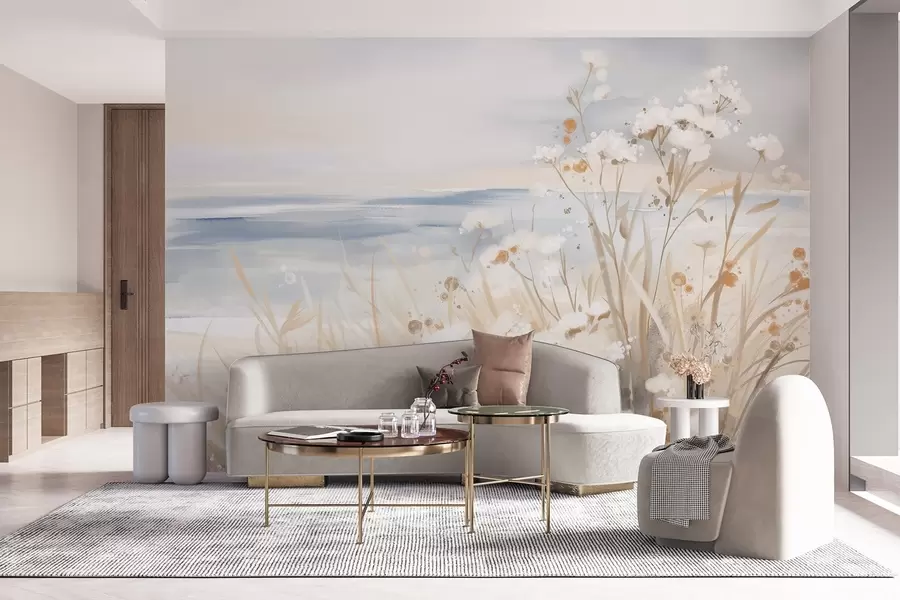 fototapeter Hvite, abstrakte blomster med delikate stilker i gresset, mot en myk, dempet bakgrunn av et rolig hav og himmel  w08740