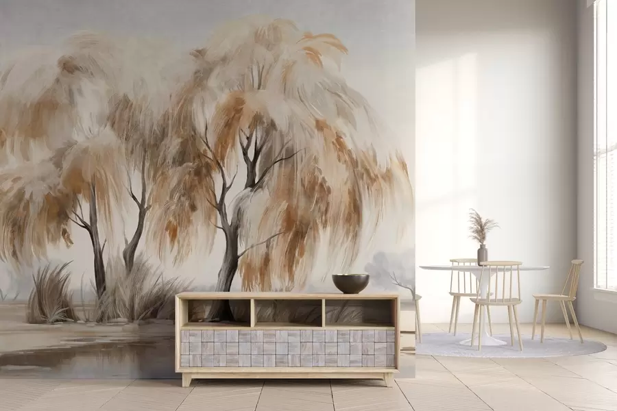 fototapeter Strukturerte piletrær med brune og hvite blader ved bredden av en innsjø, med litt gress rundt seg, i en tåkete dag w09268